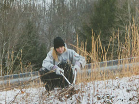 Kasey clearing brush